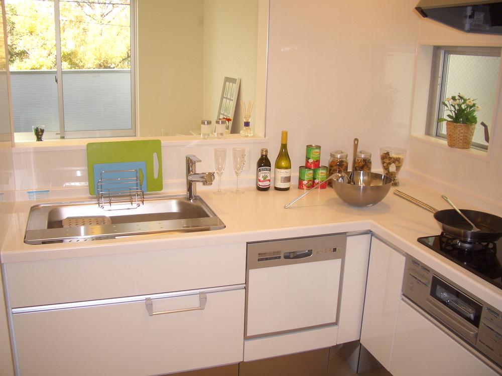 Kitchen. Kitchen of A Building is good usability in the L-shaped counter kitchen. 