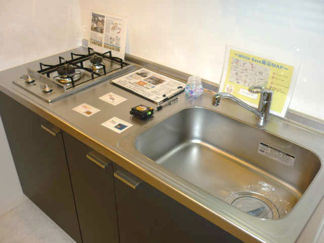 Kitchen. There is a two-necked gas