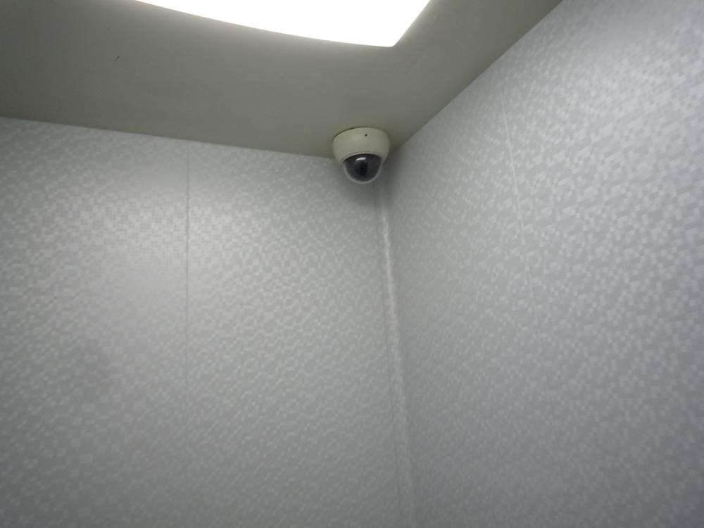 Other common areas. Surveillance camera-equipped elevator
