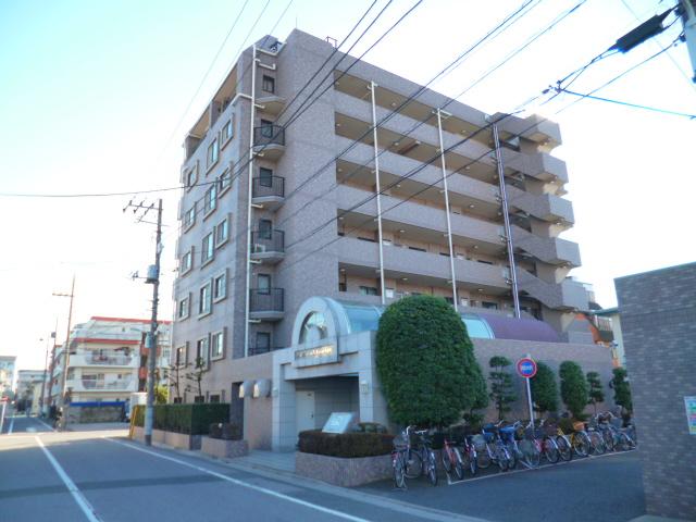 Local appearance photo. 1994 architecture ・ Tile is pasted auto-lock of the property