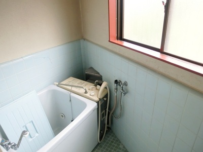 Bath. These are balanced kettle. With a window is bright bathroom.