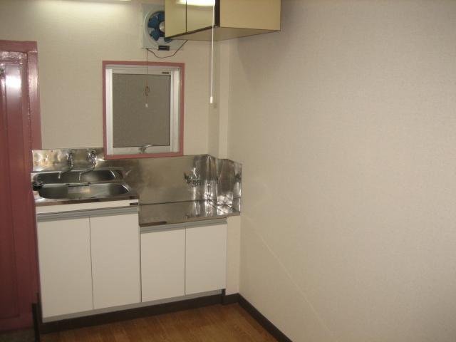 Other room space. Kitchen space