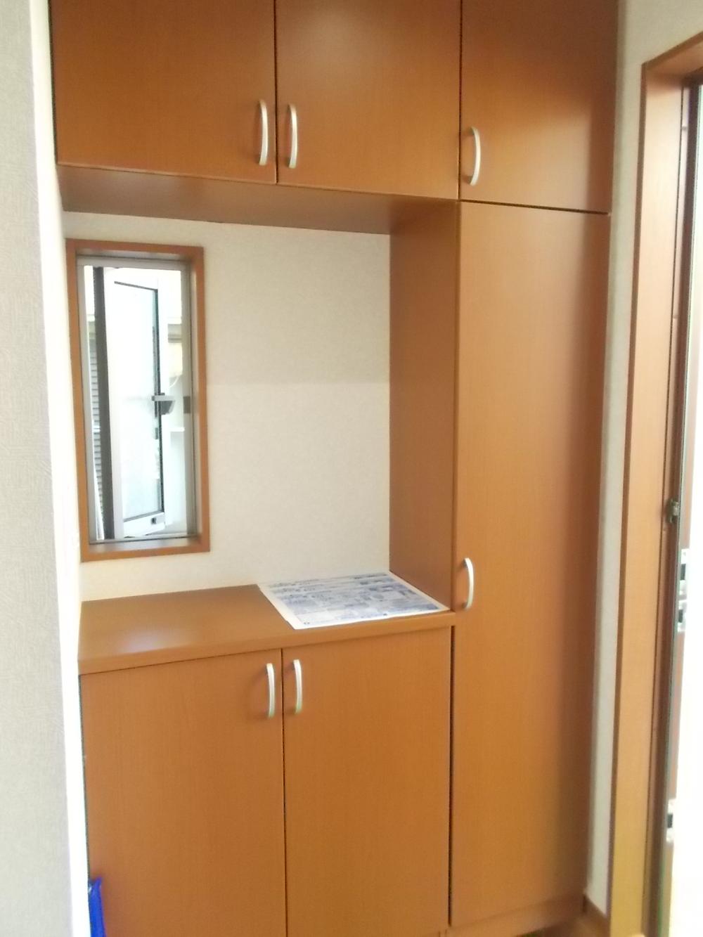 Entrance. Maeru the family of shoes neat entrance storage