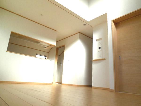 Living. Drenched natural light from expansive atrium