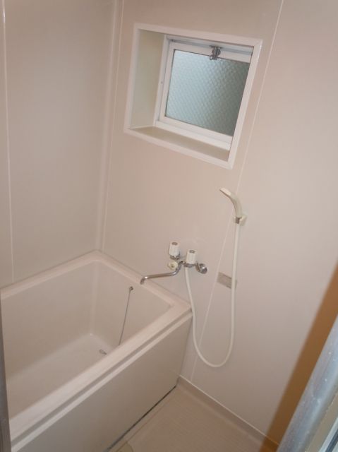 Bath. There are window.