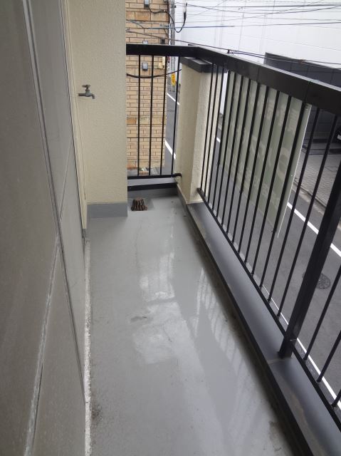 Balcony. There is also a hand-wash basin.