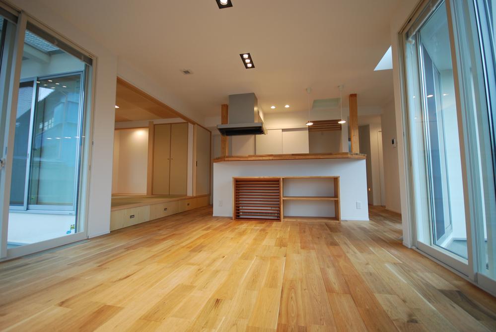 Living. Spacious open-plan living space was wrapped gently in natural light.