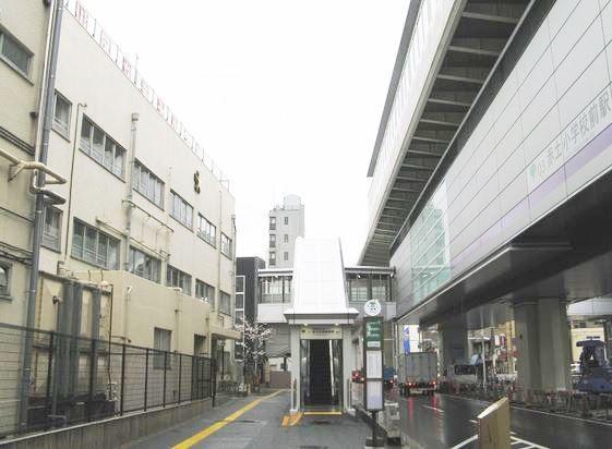 Other. Red soil elementary school before the station