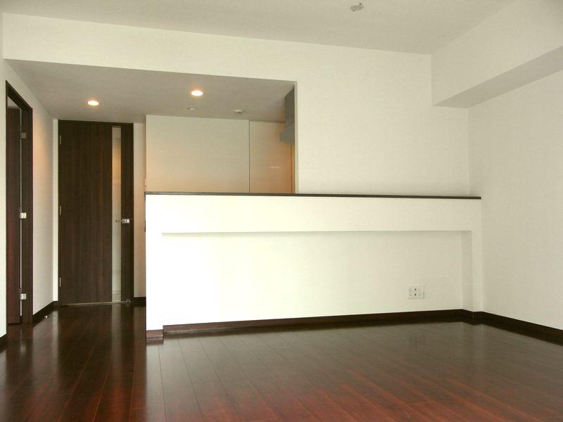 Living. The LDK, which have a more sense of unity the hanging cupboard from the counter part in the design was changed to the kitchen back part.