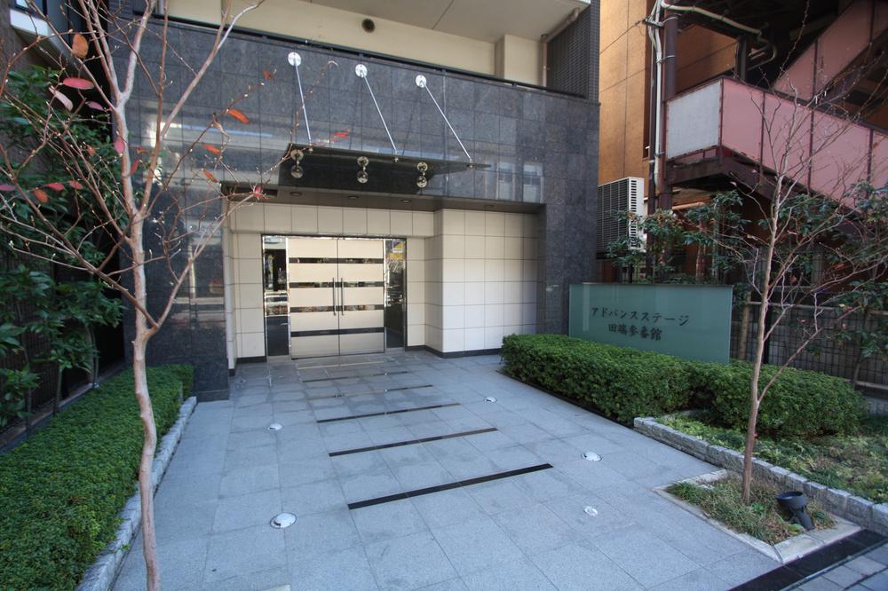 Entrance. Beautiful entrance planted the green.