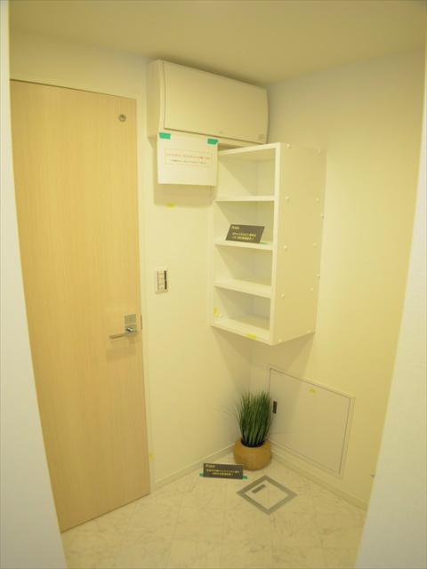 Wash basin, toilet. Convenient washroom storage