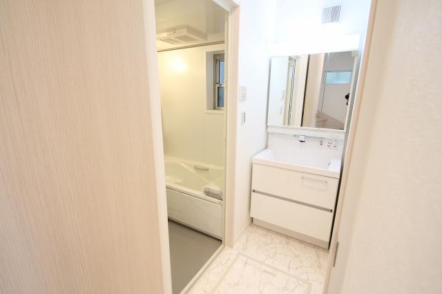 Wash basin, toilet. Washroom