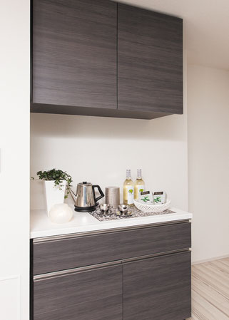 Kitchen.  [Cupboard with counter] To all types of kitchen, It can be rich in accommodating the tableware, Installing a storage cupboard and with counter hanging. It serves as a small work space, Place the personal computer is convenient can also be used to check the cooking information.