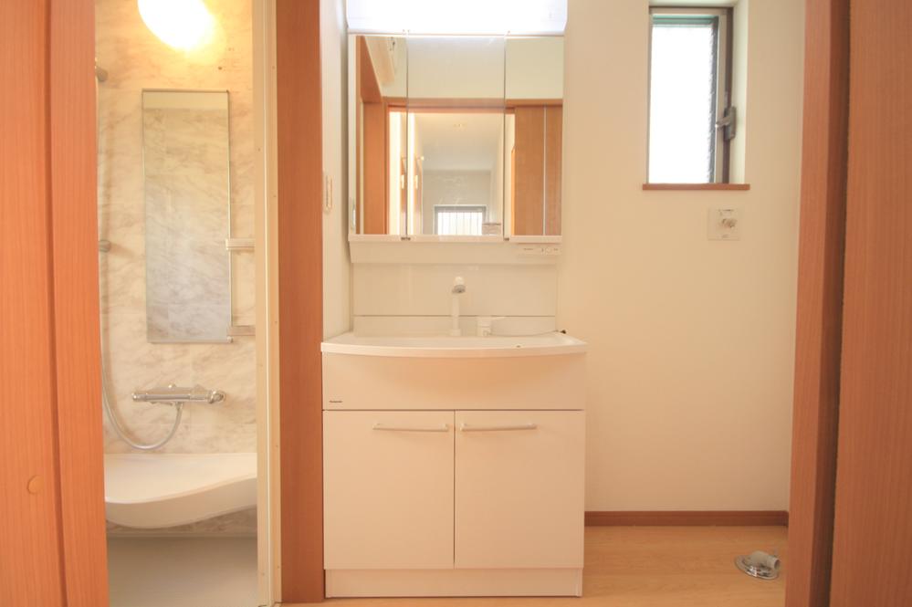 Wash basin, toilet. A Building Local Photos