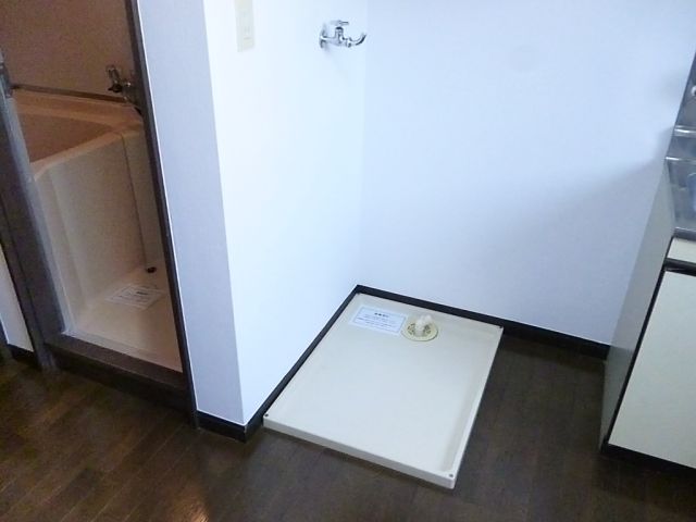Other. Washing machine is put in a room.