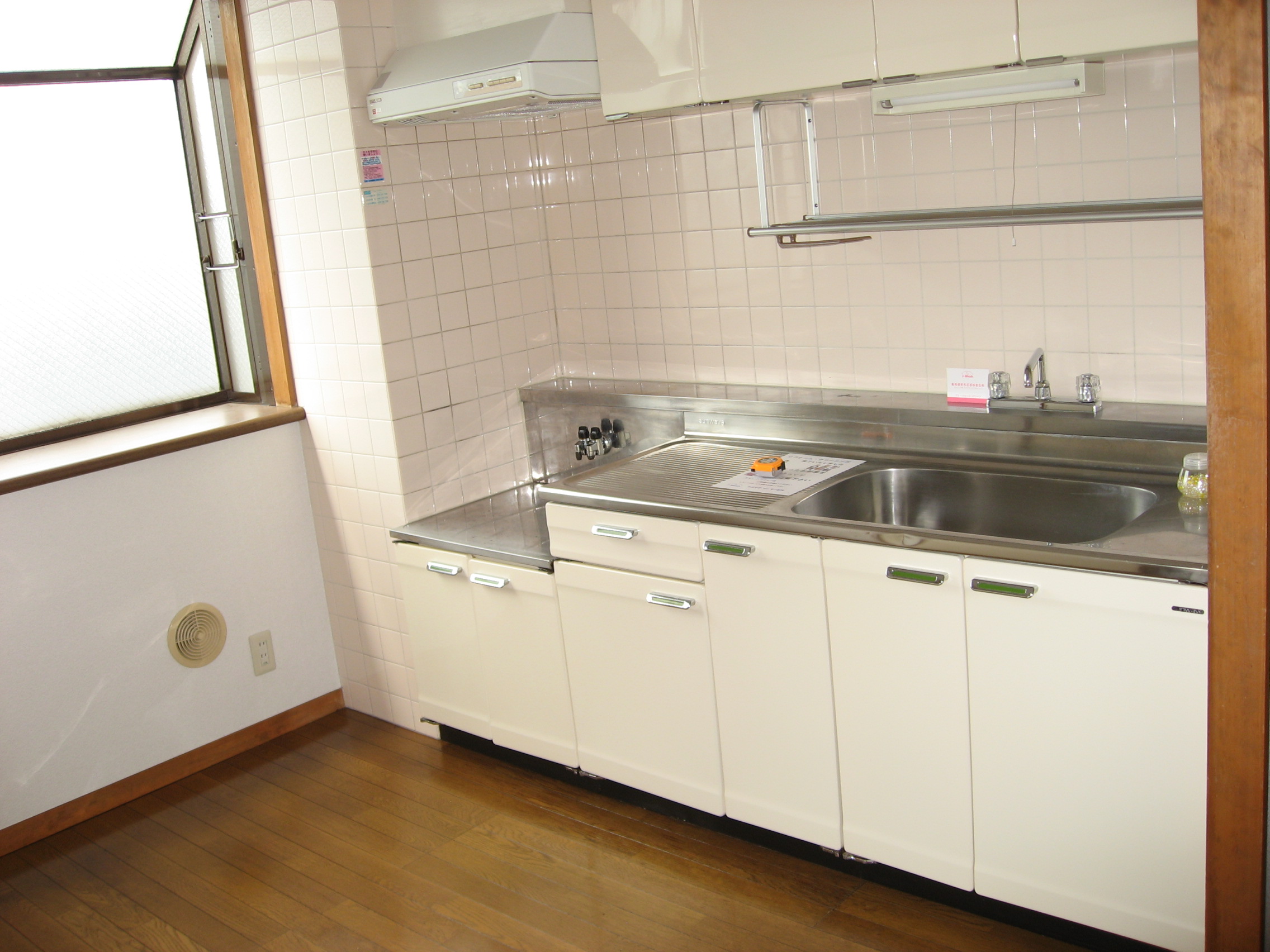 Kitchen. Bright kitchen with a large bay window with!