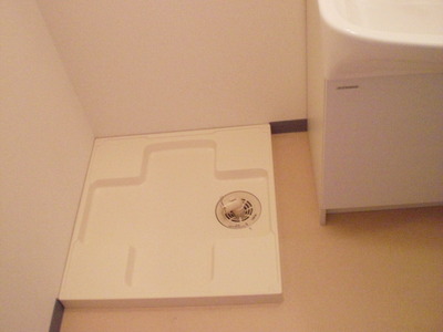 Other Equipment. Washing machine in the room