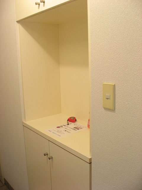 Entrance. The cabinet on the footwear put try to put the flowers and photos ・ ・ ・ ?