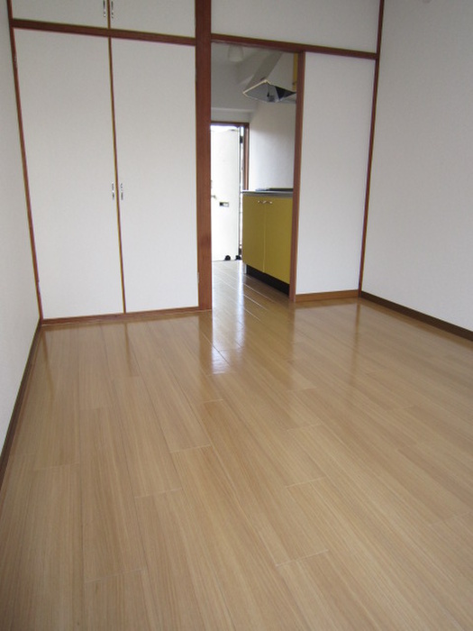 Living and room. Western-style is the flooring of the room.