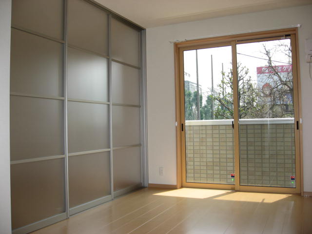 Living and room. Stylish screen door separating the living room and Western!