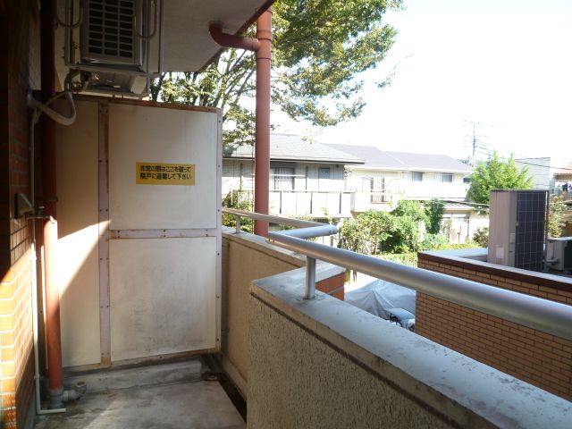Balcony. Spacious veranda! Washing machine storage is also here. 