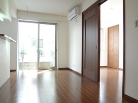 Living and room. There is a feeling of cleanliness throughout the chic colors