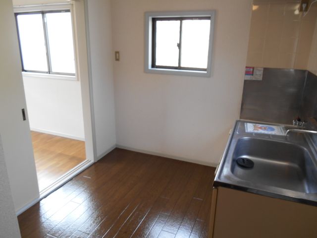 Kitchen. There is space put a refrigerator and shelves