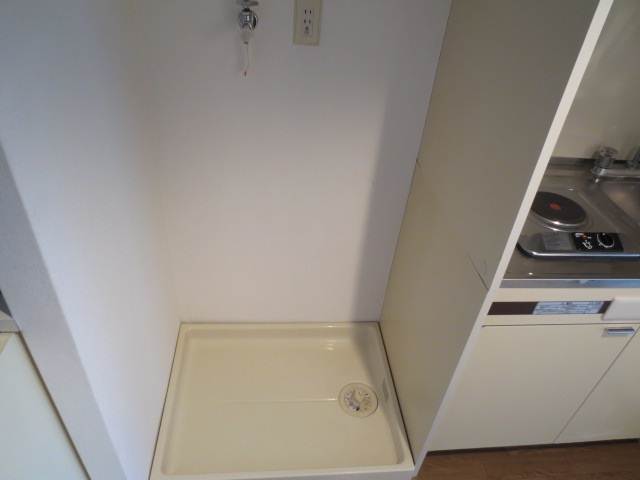 Other Equipment. Washing machine in the room