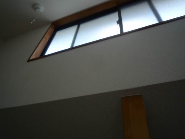 Living and room. There is a window in the loft