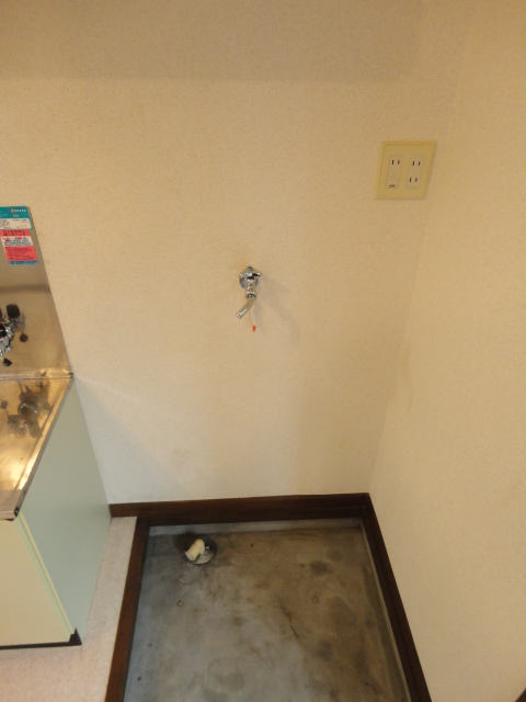 Other Equipment. Washing machine in the room