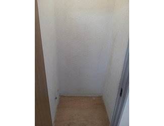 Other room space. Washing machine in the room