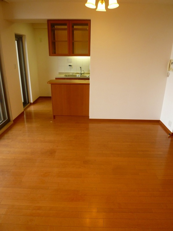 Living and room. The photograph is a different Room No..