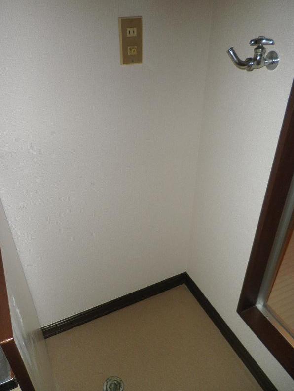 Other Equipment. Washing machine in the room