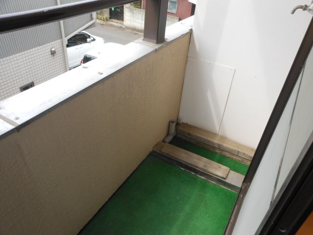 Balcony. Laundry Area is located in the veranda