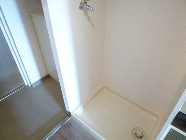 Other Equipment. Washing machine in the room