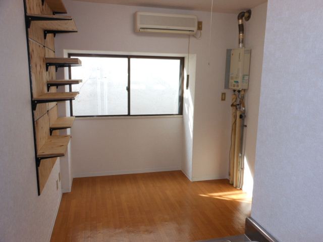 Living and room. Stylish shelf will is attached to the wall of the room ☆