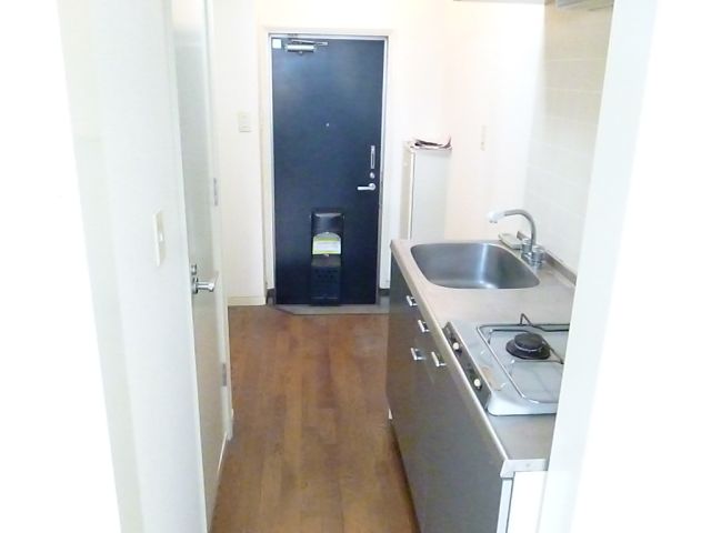 Kitchen. There is space put refrigerator