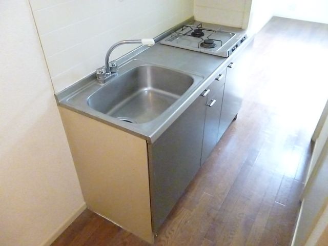 Kitchen. 2 lot gas stoves with a kitchen