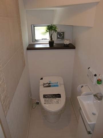 Toilet. It is a tankless toilet. I wall remote control and hand washing is very fashionable.