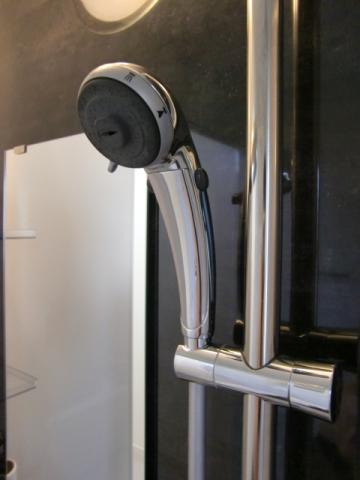 Bathroom. Shower nozzle, State-of-the-art spray & stop function and small water design. Slide hook specification.