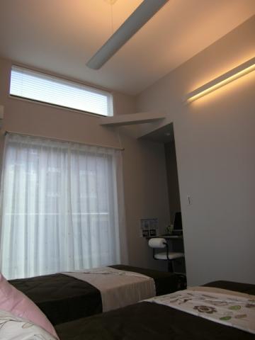 Non-living room. The main bedroom has high ceilings and indirect lighting. There is also a PC space.