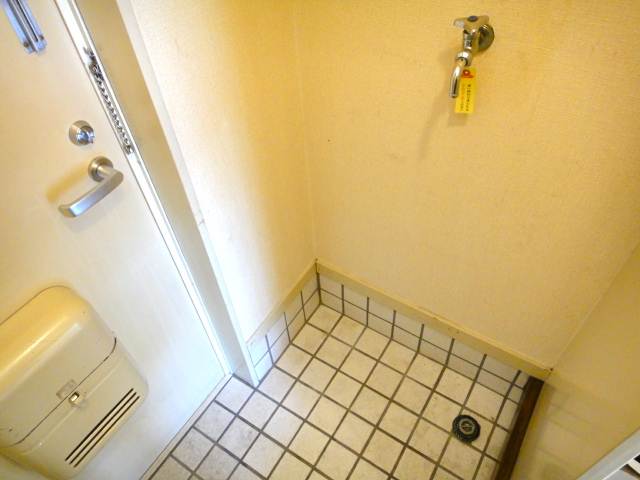 Other Equipment. Washing machine in the room