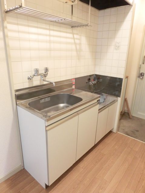 Kitchen. It is also a kitchen there is a storeroom space at the top