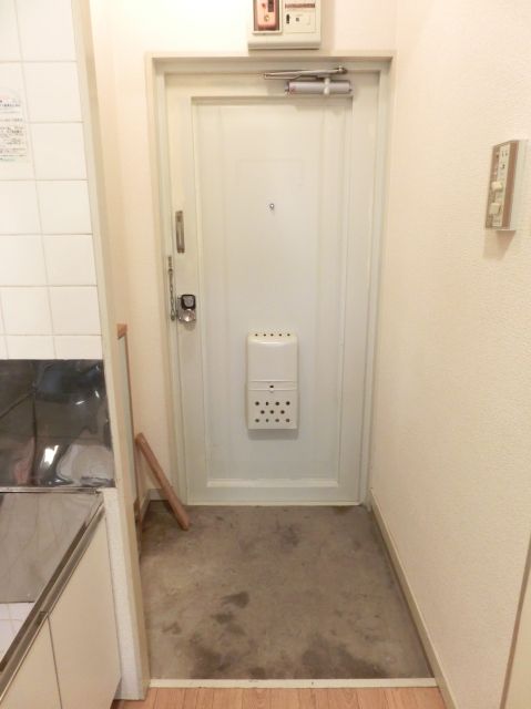 Entrance. It is the entrance with a shoebox