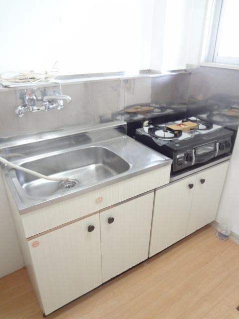 Kitchen. It comes with 2 lot gas stoves