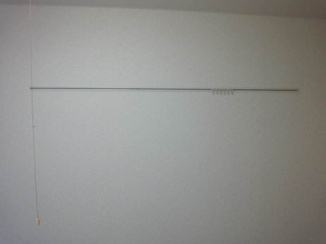 Living and room. Convenient curtain rail