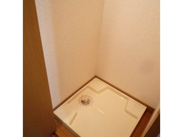 Other Equipment. Washing machine in the room