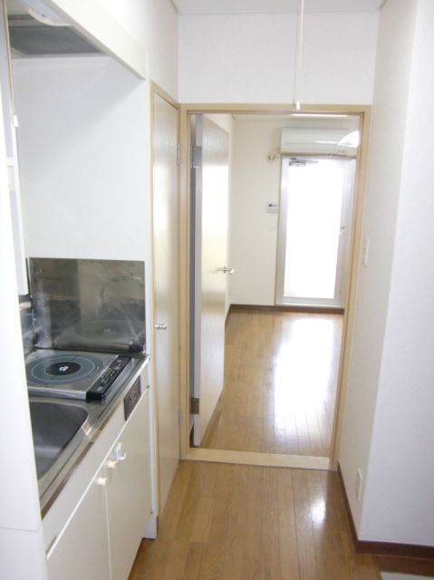 Living and room. It is around the kitchen