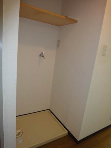 Other Equipment. Washing machine in the room