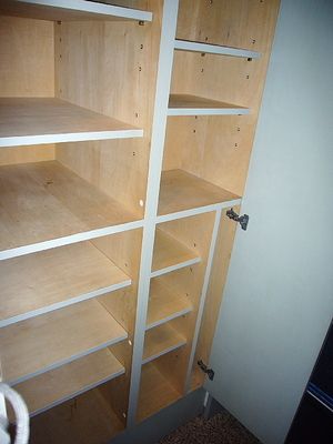 Entrance. Cupboard and front door storage